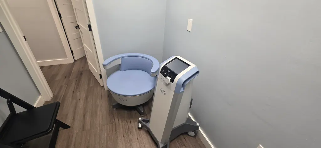 The treatment room with the seated pelvic-floor therapy chair