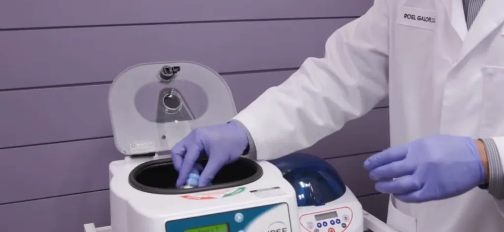 Preparing a sample in the centrifuge at the clinic